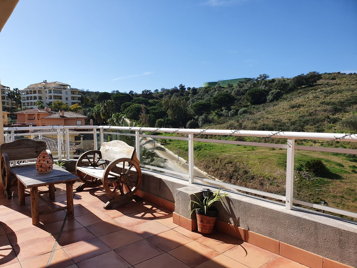Beautiful two-bedroom penthouse in a private urbanization with garden, pool and playground in Cala H, Spain