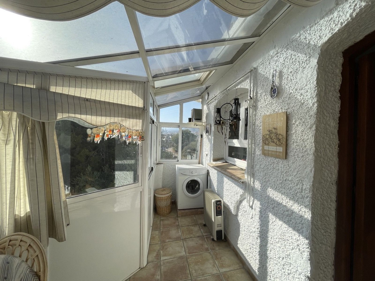 Located above Burriana Beach in the Chiminea area of Nerja is this lovely 2 bedroom, 2 bathroom townhouse which is distributed on two levels.