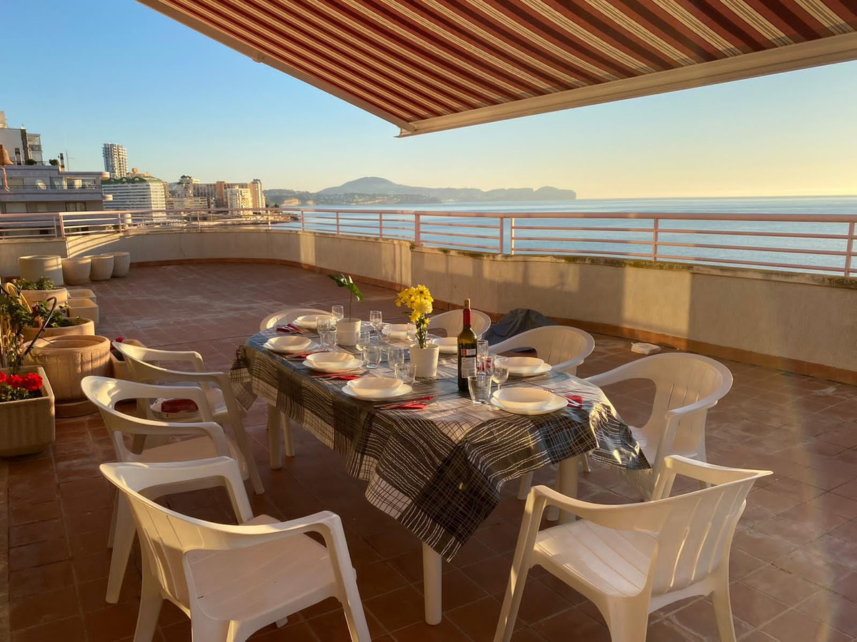 This magnificent penthouse is for sale on the beachfront of La Fossa with a beautiful terrace facing, Spain