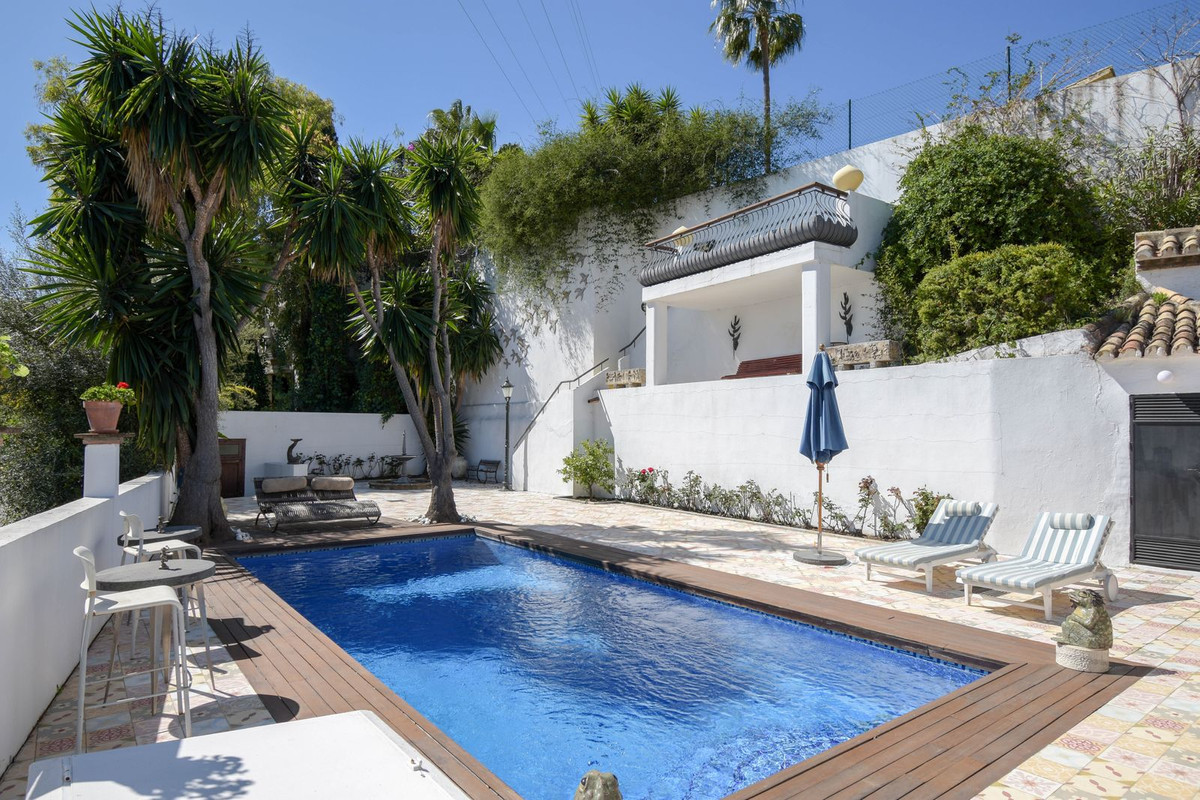 This villa is beautifully situated on a quiet street in a charming residential area close to cozy Sa Spain