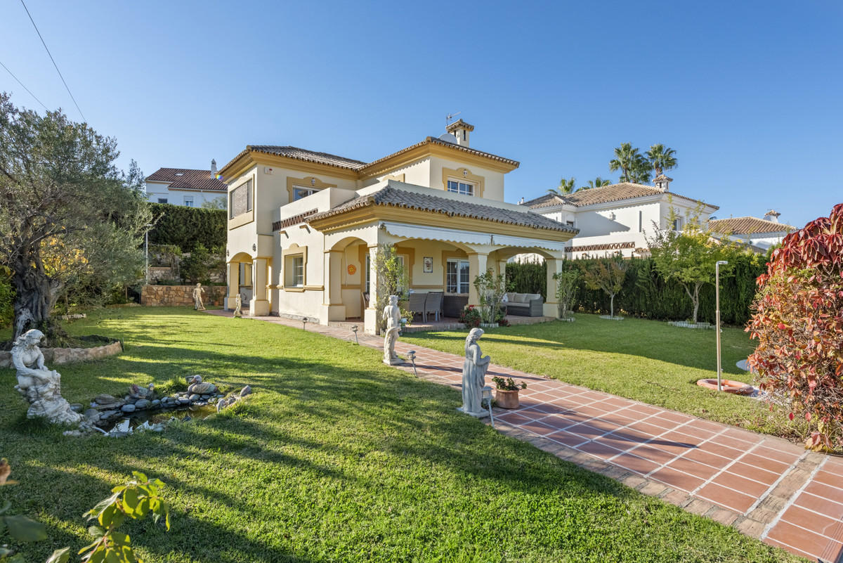 Lovely villa set on a large sunny plot with a private garden and heated swimming pool. Nice views to, Spain