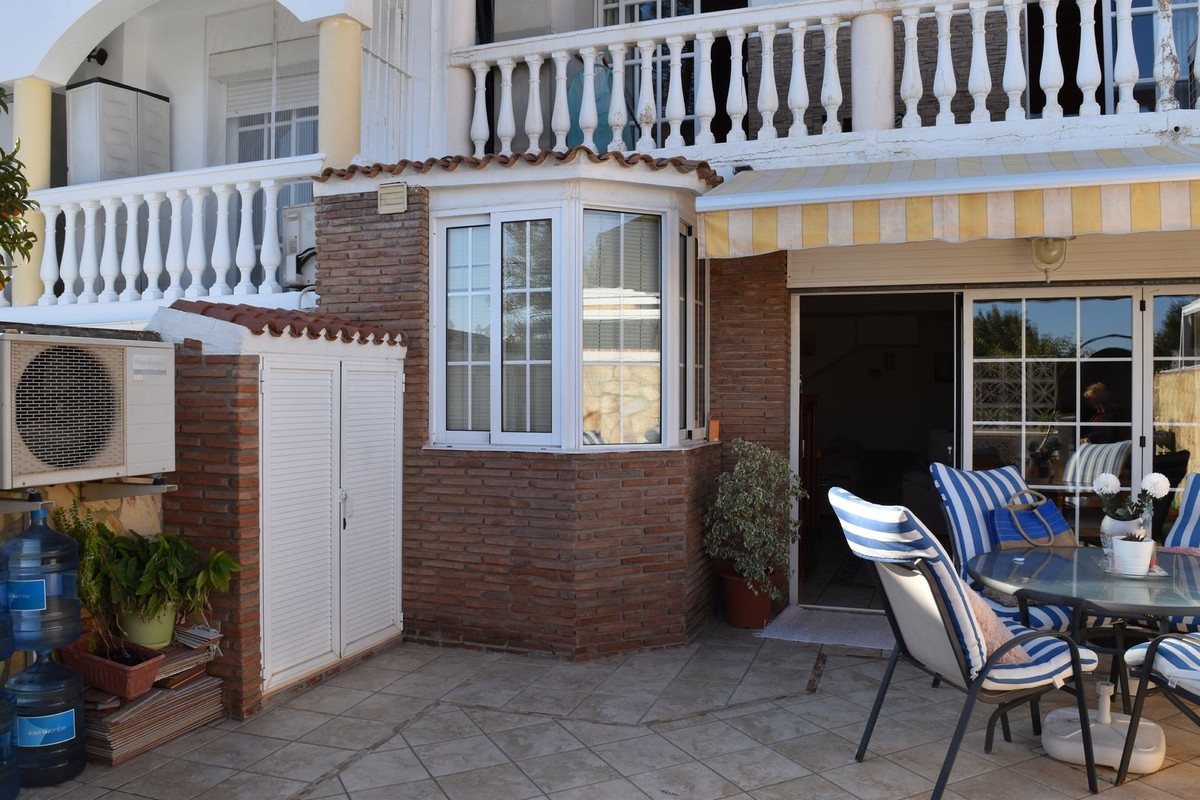 Townhouse with a terrace is currently available for sale, ideally situated in close proximity to the, Spain