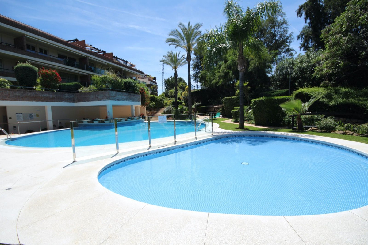 This South facing 2 bedroom luxury1st floor apartment with garden and golf views is situated within , Spain