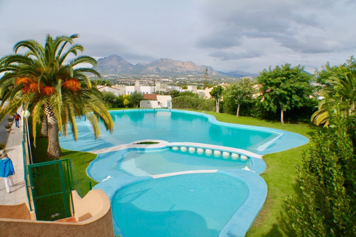 Bungalow in urbanization serrada with communal pool and very beautiful gardens with two floors in Al, Spain