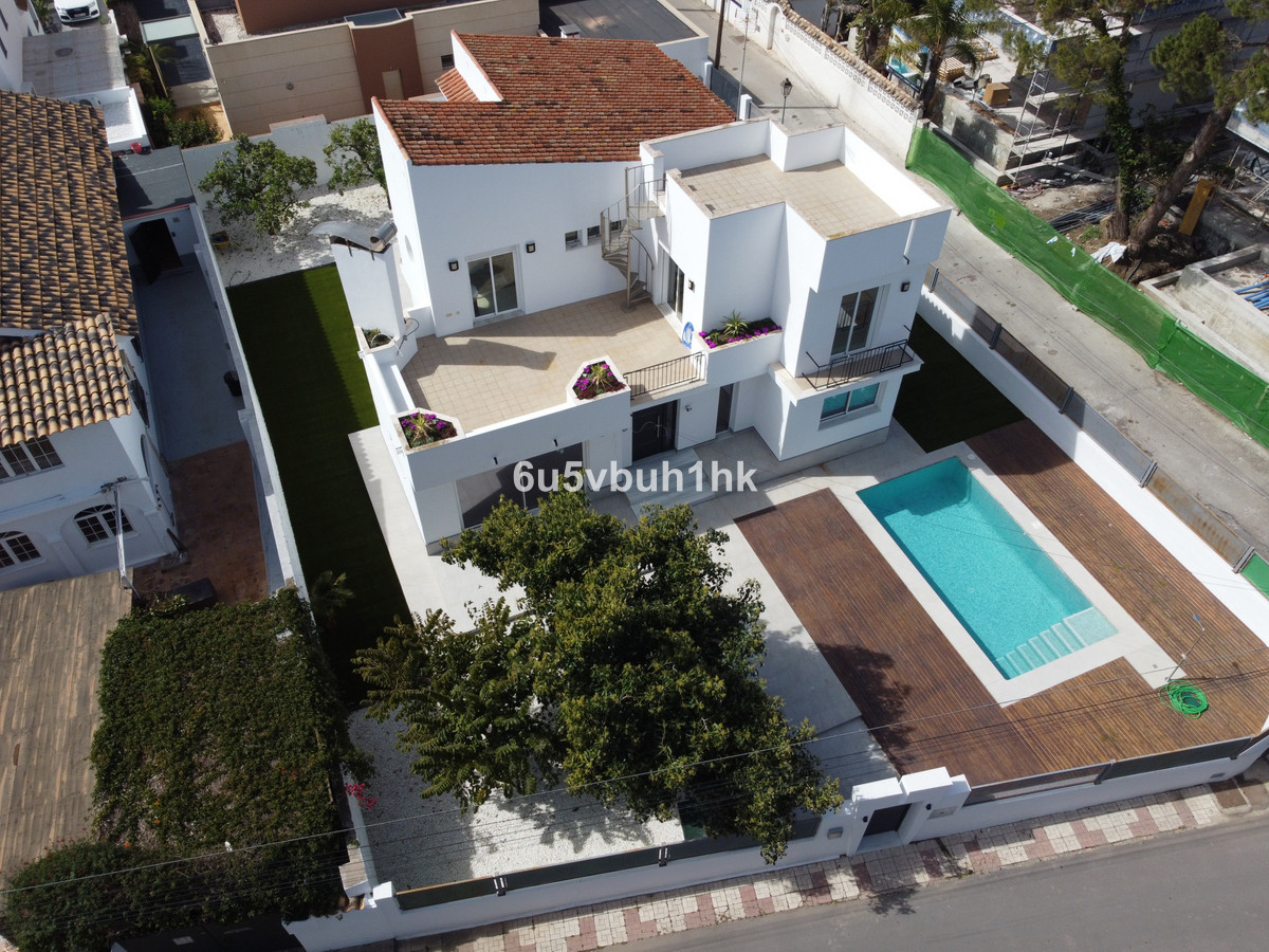 Luxury beachside partially renovated villa in a prime location, only 200 meters to the beach promena, Spain