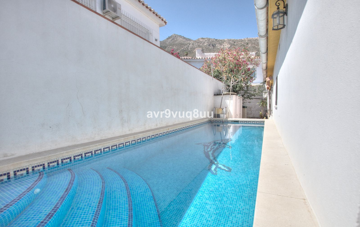 This beautiful villa is situated at the very top of Arroyo de la Miel, in a very established, sought, Spain