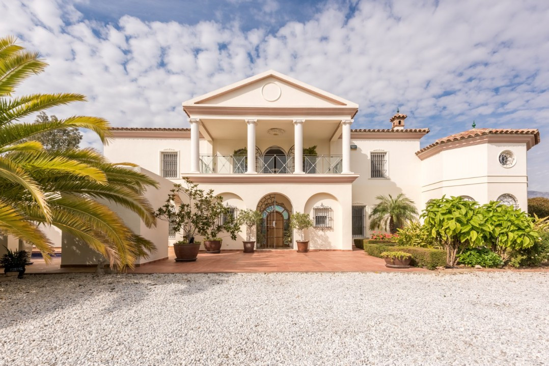 The Monte Cielo property is a beautiful colonial-style house.