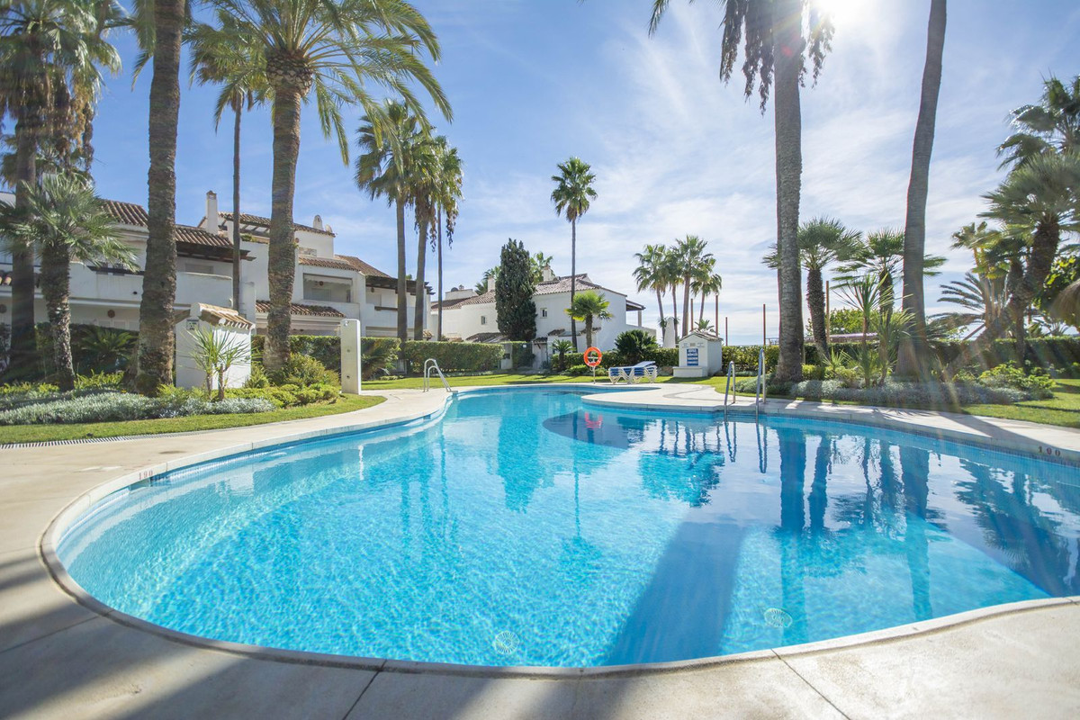 This frontline beach townhouse is situated in Bahia de Marbella on one of the best beaches in Marbel, Spain