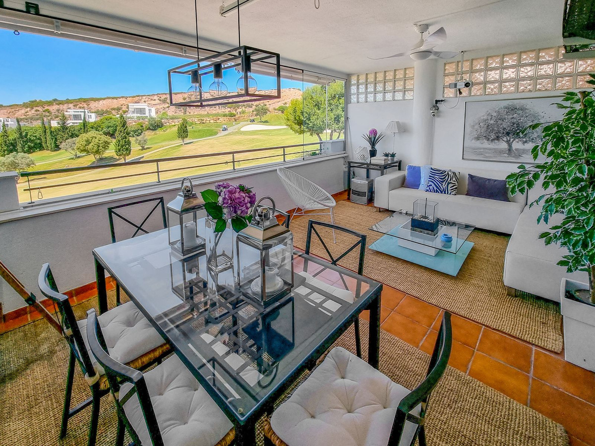 Completely renovated 3-bed apartment with large terrace and sea and golf views.

This apartment has , Spain