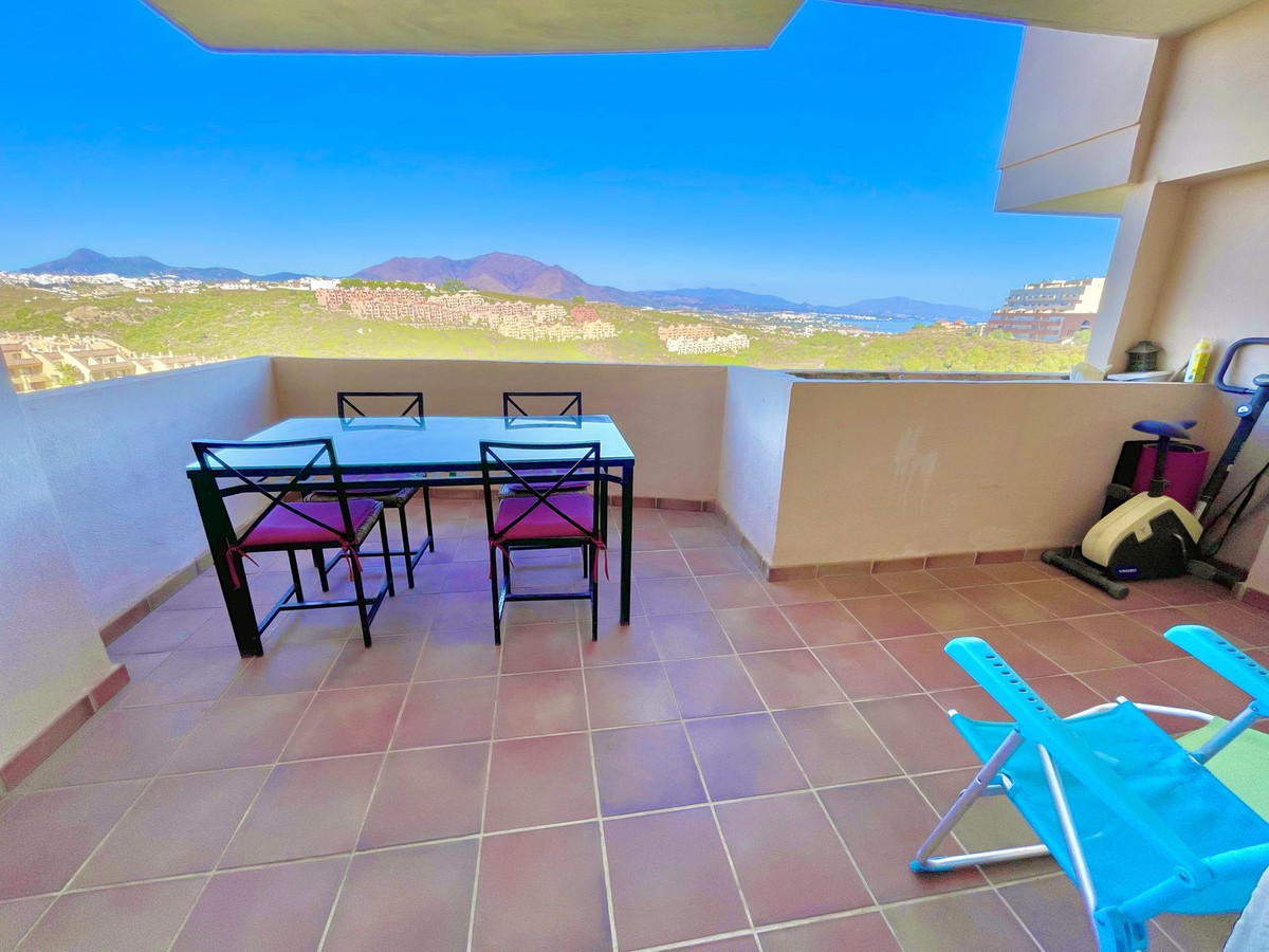 Stunning views to the sea and golf course from this bright two bedrooms and two bathrooms elevated g, Spain