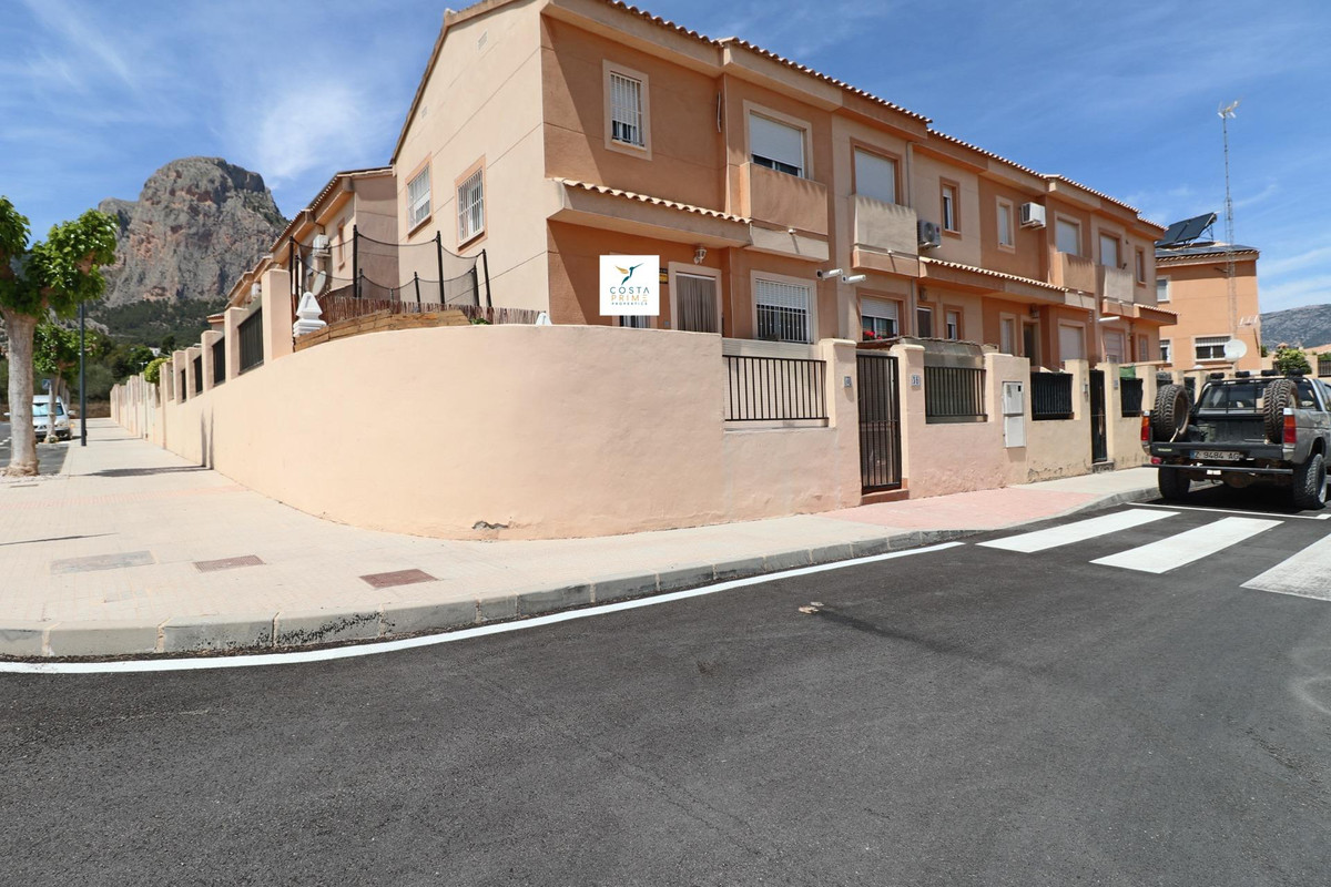 Corner semi-detached house in Polop, built on 3 floors.. . On the main floor we have the living room, Spain