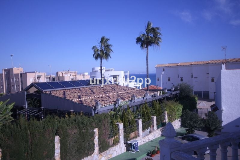Terraced villa. The property has an open plan living area with French kitchen. There are stairs in t Spain