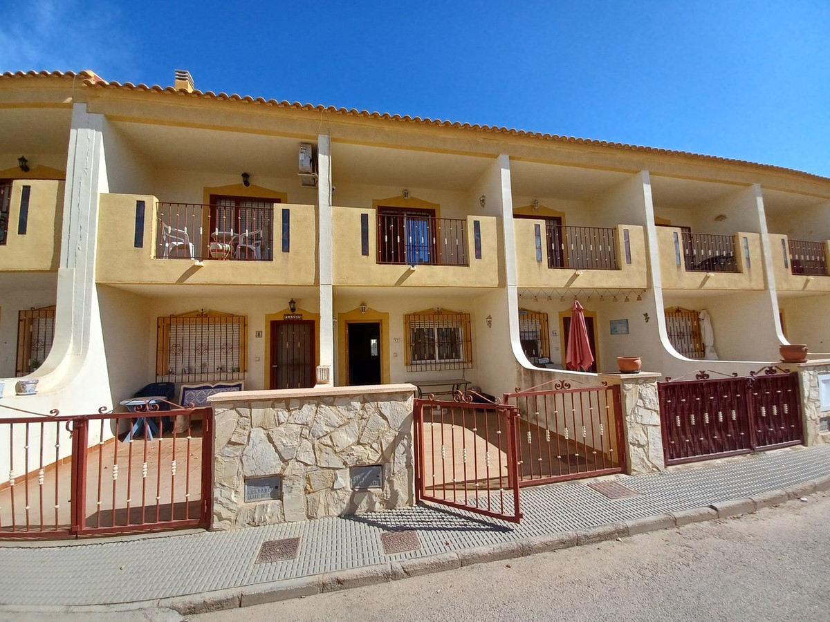 We are proud to offer this well positioned townhouse close to all amenities.  The front patio leads , Spain