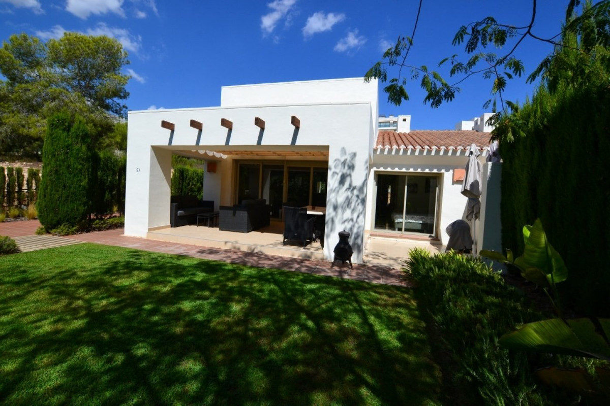 This luxury south facing semi-detached villa is all on one level with a large garden in the exclusiv, Spain