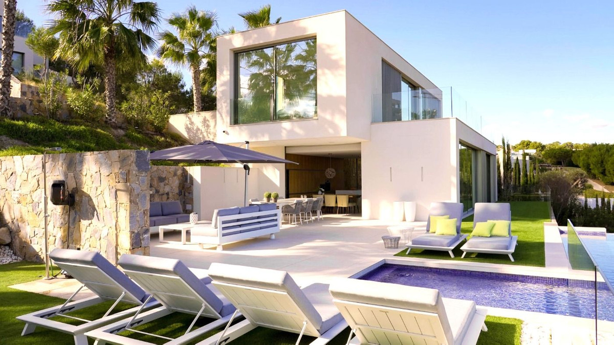 This luxurious uniquely designed villa is located in the prestigious Las Colinas Golf Resort, an exc, Spain