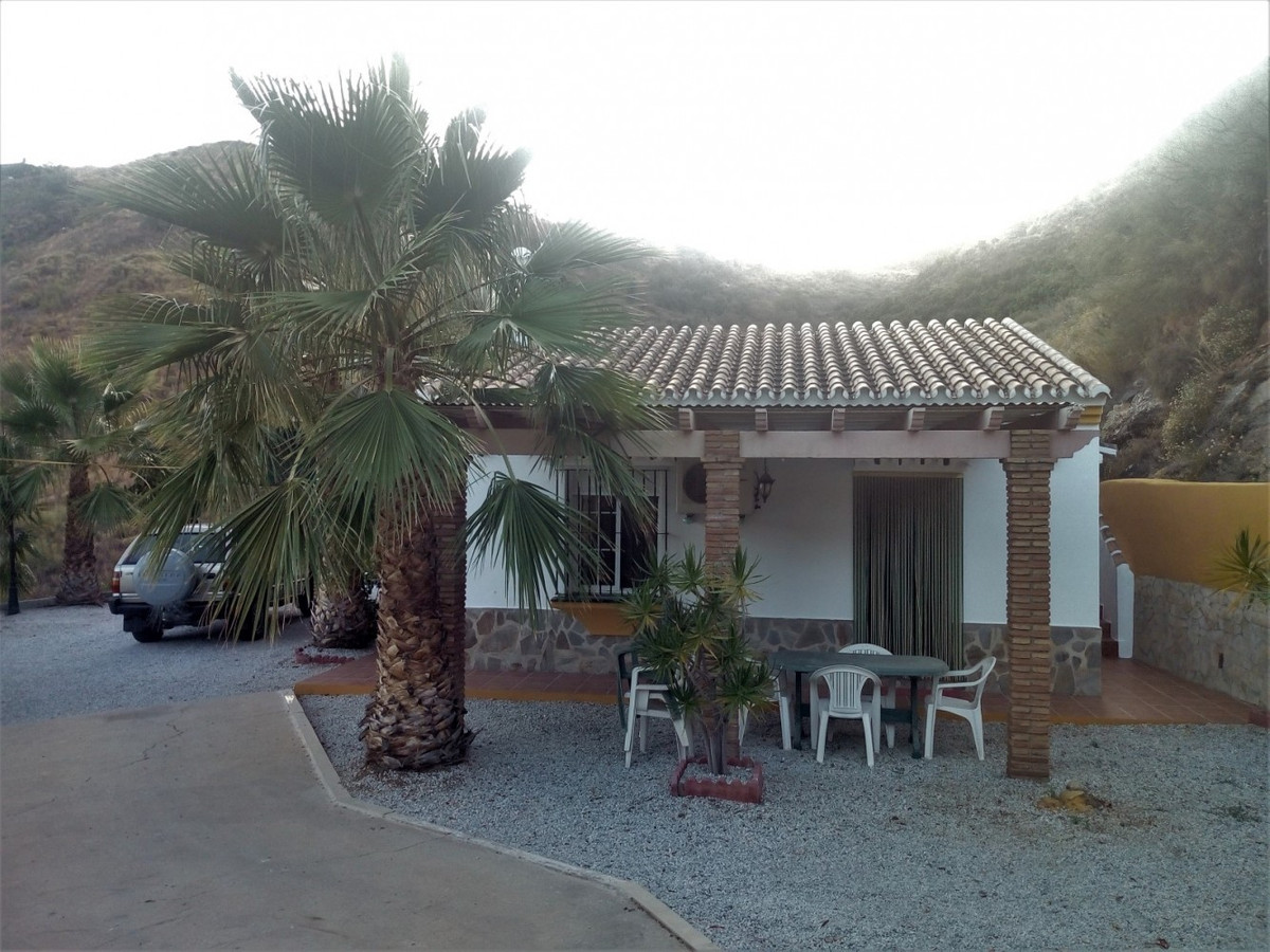 Just seven minutes from the city of Velez-Malaga is this fantastic finca with a country house and pa, Spain
