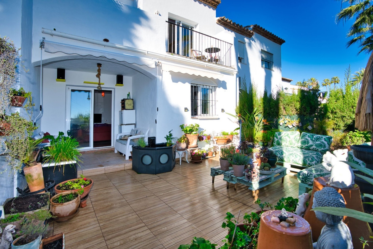 Beautifully renovated 3 bedroom townhouse with private garden located in the popular Villas Madrid c, Spain