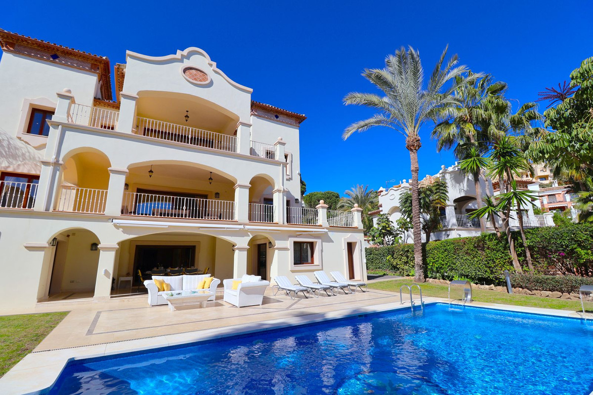 A beautiful fully furnished Andalucian style villa on a large corner plot located in the prestigious, Spain