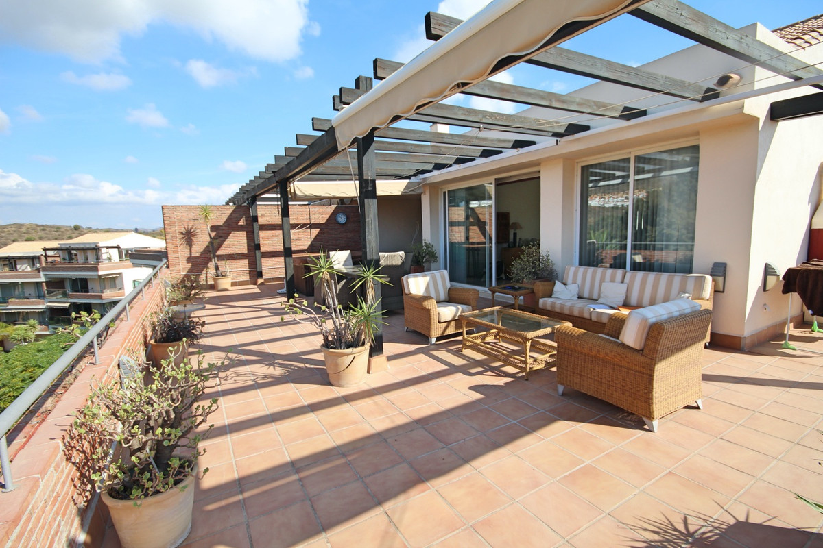 This bright, unusually large 3 bedroom luxury, south facing corner penthouse is situated within the  Spain