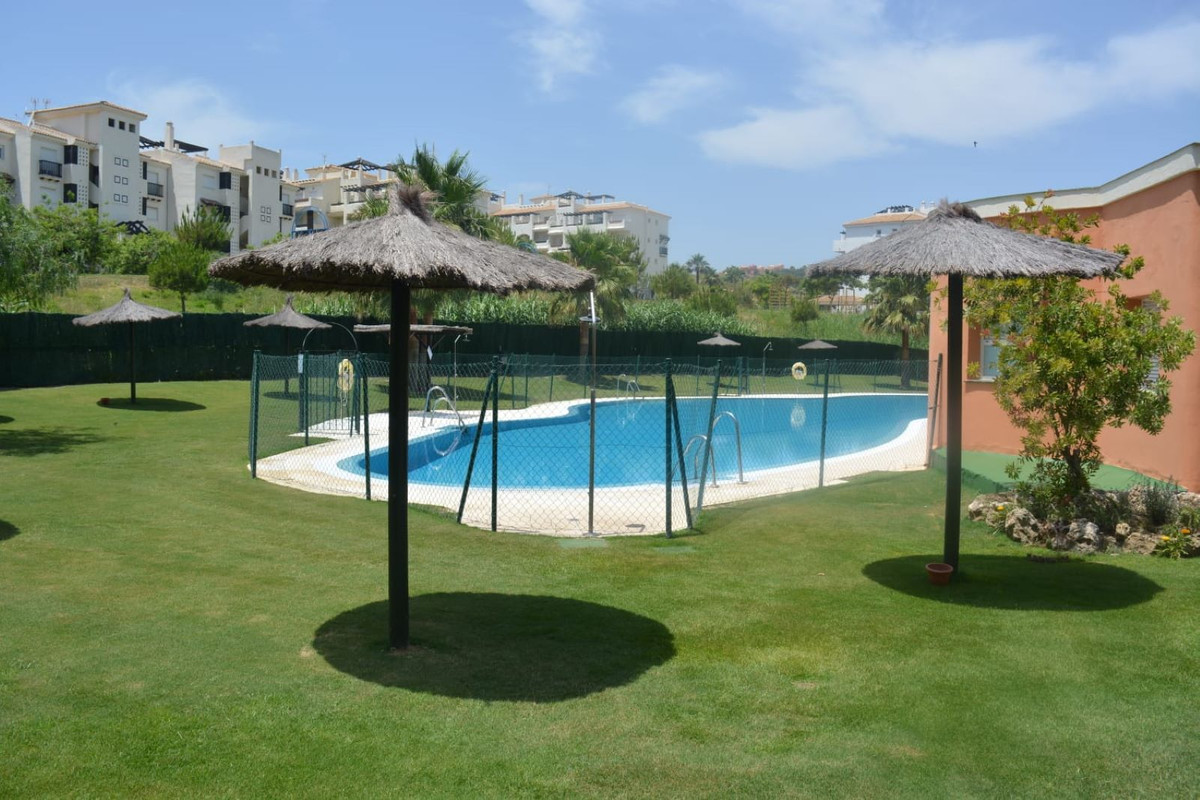 Beautiful two-bedroom apartment for sale with two bathrooms, on the ground floor with a large terrac, Spain