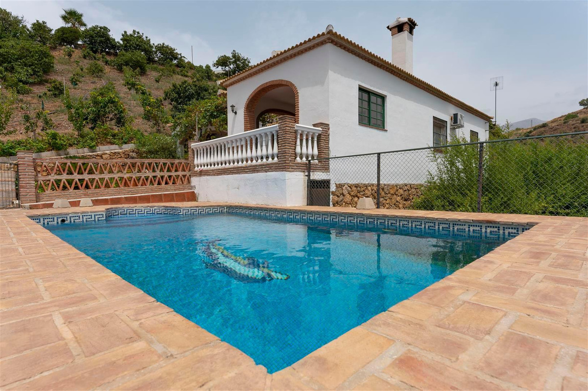 A unique opportunity to purchase two independent houses on one plot, only 18 mins drive to the coast, Spain