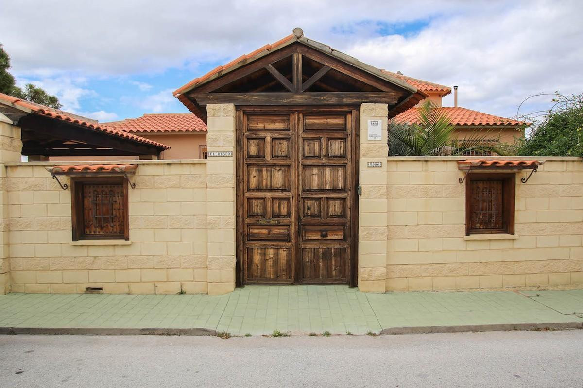 IMPRESSIVE three-storey villa in Los Pinos de Alhaurin.