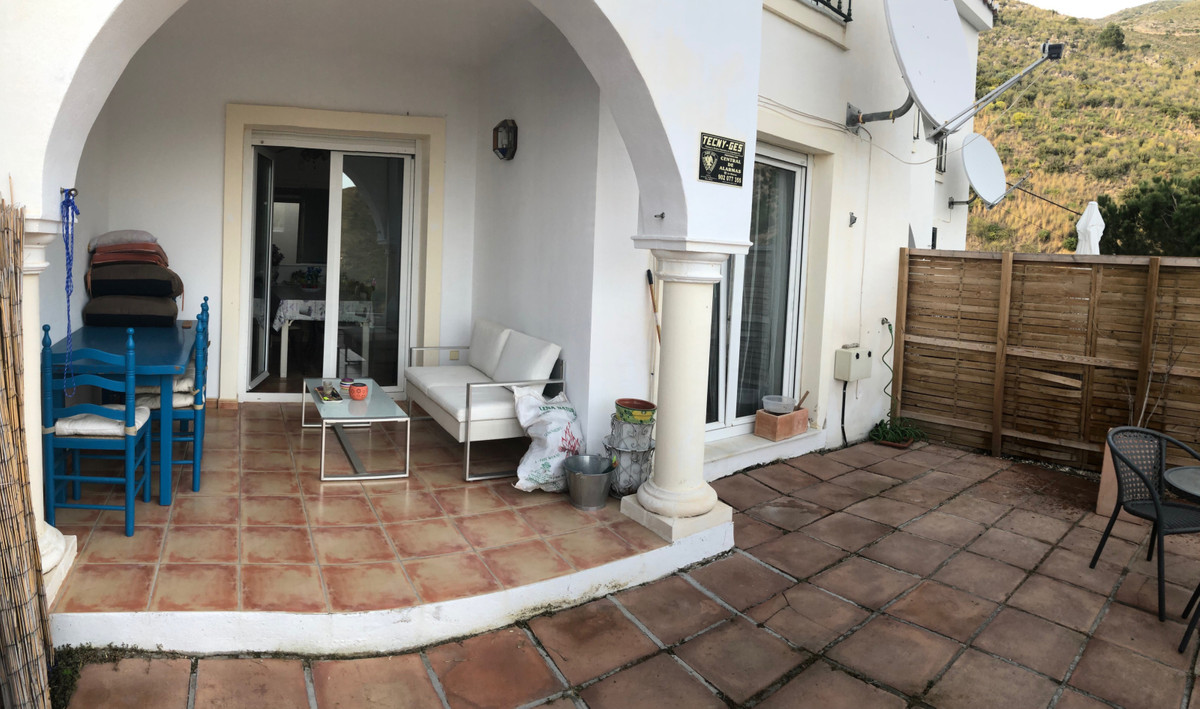 East facing townhouse with  3 double bedrooms with covered terrace and bathroom on the upper floor , living room dining room with showeroom kitchen...