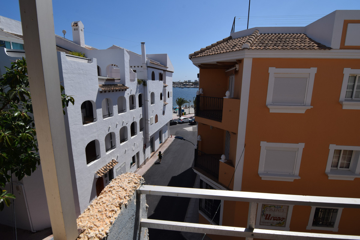 This is an excellently situated, two bedroom,one bathroom, atic apartment, with lovely sea views. Su, Spain