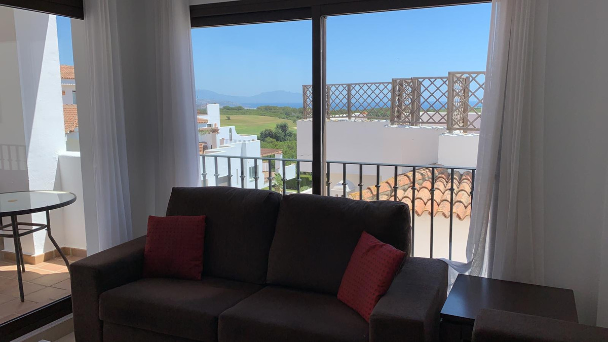 This apartment is located on front line golf with panoramic sea and golf views. On a clear day, the African coast and Atlas mountains can be seen.