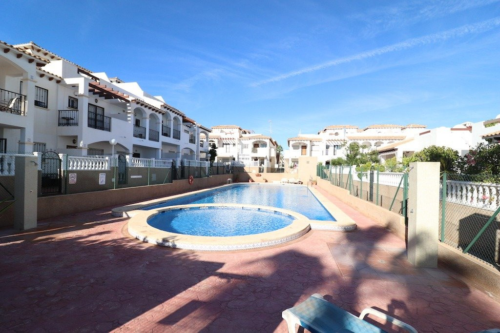 La Cinuelica in Punta Prima, a 71 m2 corner townhouse with a 35 m2 paved garden, with 2 bedrooms, 2 , Spain