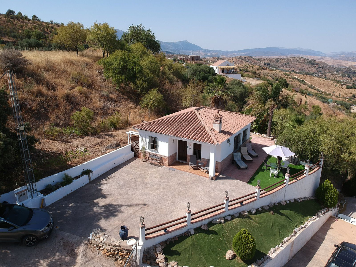 Charming finca perched on the side of a hill with superb panoramic country views. 

The house is on , Spain