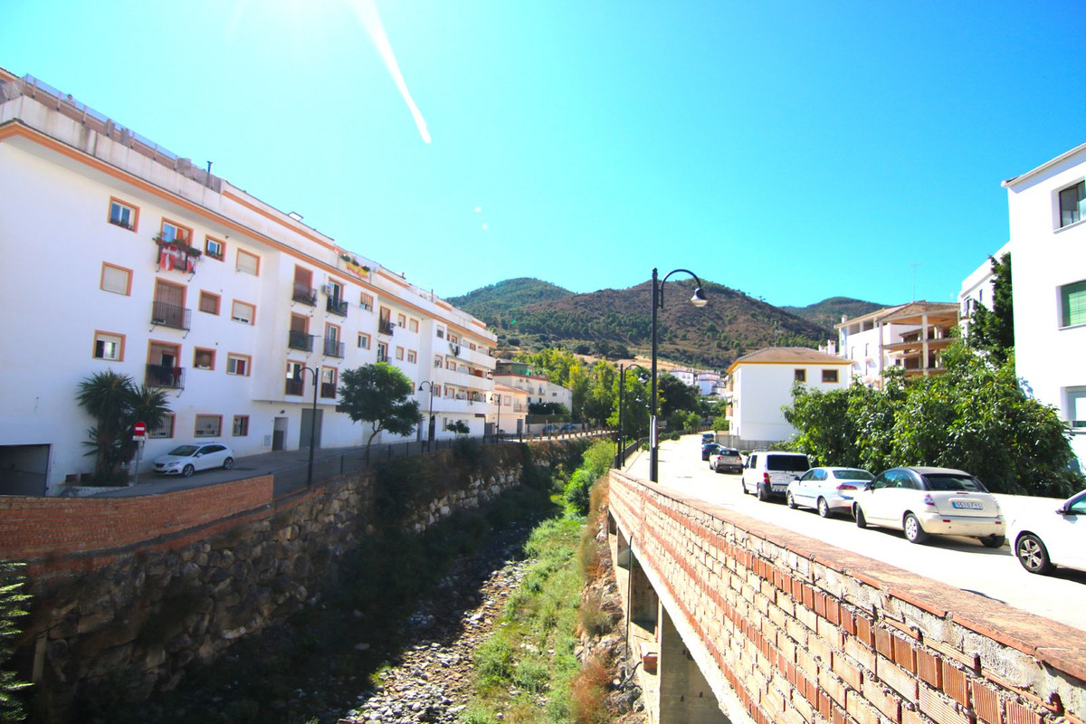 Traditional house in Tolox with the Sierra de las Nieves behind.