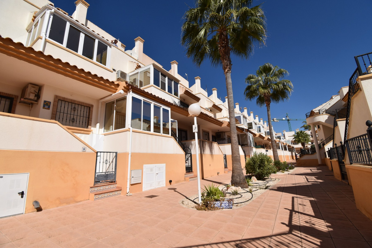 This East &amp; West Facing, Three Bedroom Townhouse in Villamartin is located on The Orihuela C, Spain