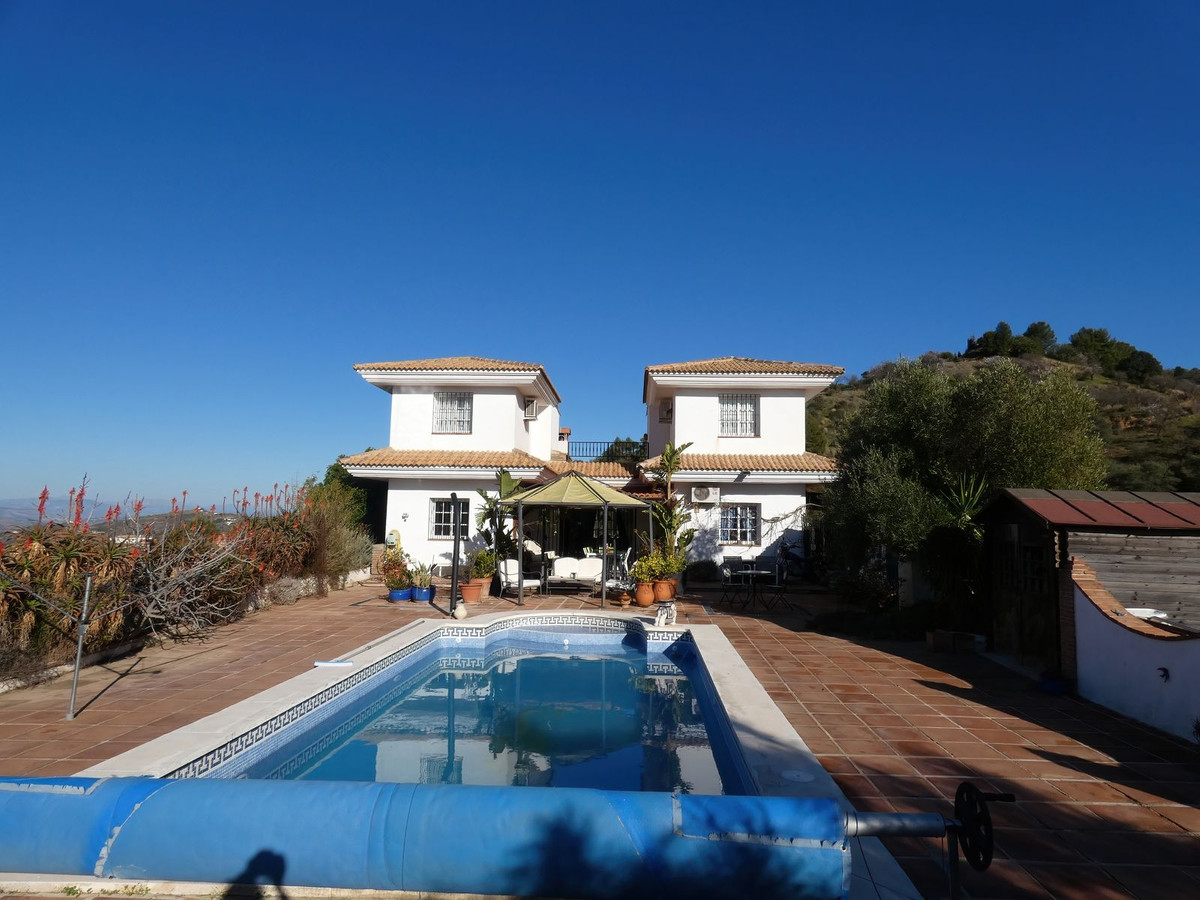 A spacious country property with beautiful panoramic views of the Monda Valley is what makes this ho, Spain