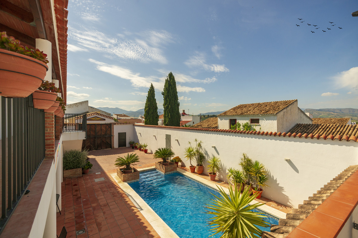 This large village property has been completely rebuild and converted into the most sublime rural to, Spain