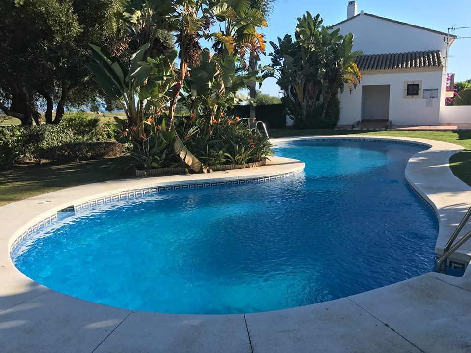 Immaculately presented 2 bedroomed townhouse located in one of the most attractive communities in Alcaidesa with open aspect and views over the gol...