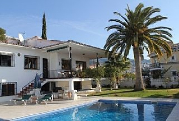 Situated in an upmarket residential area, this luxury villa is just 12 minutes walk to the town cent, Spain