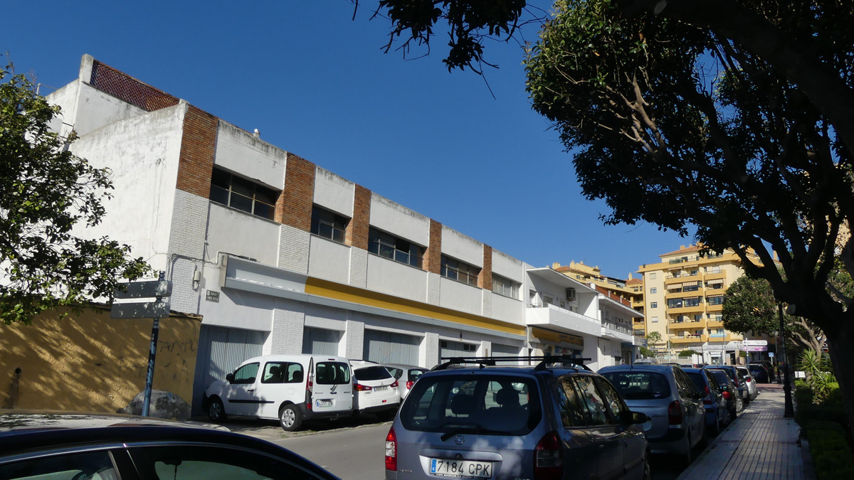 Commercial surface of 38.55 m facade. Old garage for renovation, construction of a new building, hot, Spain