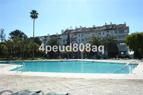 180m2 Built ground floor apartment with access onto the communal garden from its covered terrace wit, Spain